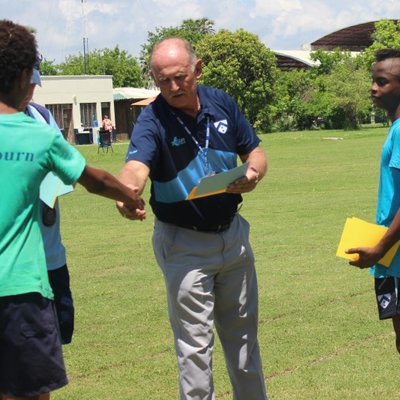 Children being handed rewards for sports